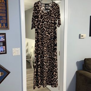 Women’s long leopard print dress with tags.
